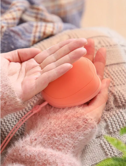 “Pawmi® – El Mini Calentador de Manos que Conquista con Calor y Ternura”